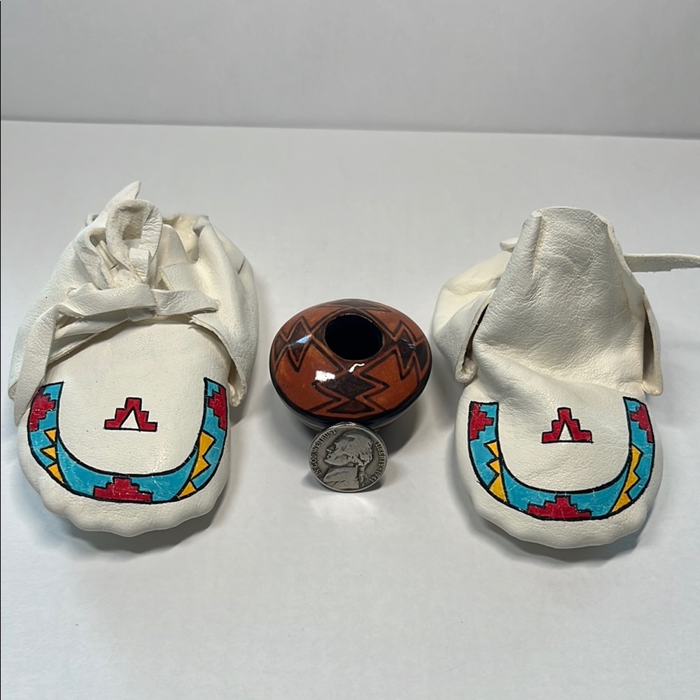 White Leather Baby Moccasins with colorful Native Design.